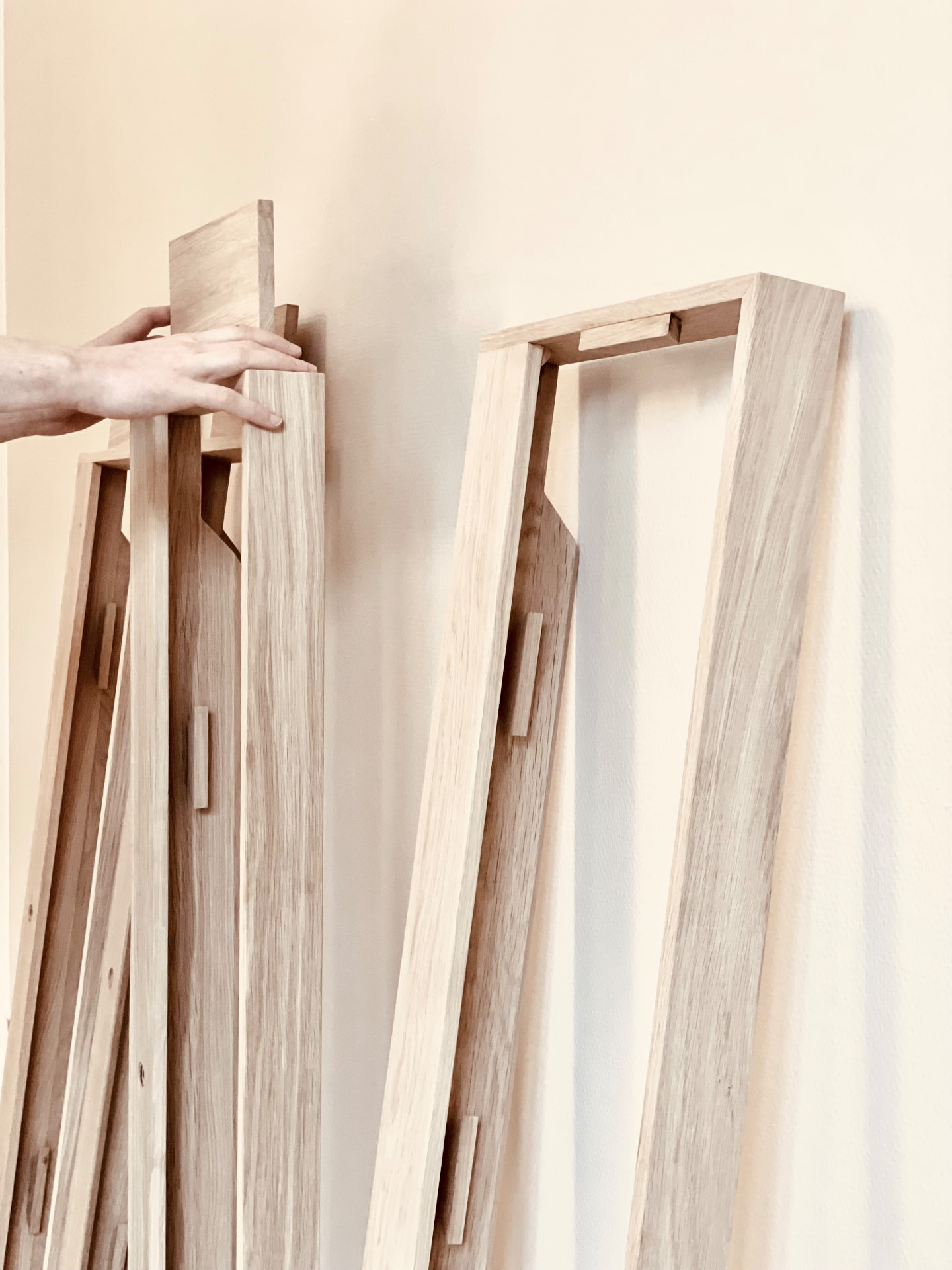 Joinery and wall bracket detail of solid oak Floating Piano Frames handmade in Denmark